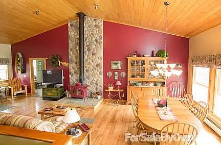 great room, wood stove, hickory floor