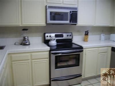 Kitchen with newer stainless steel appliance