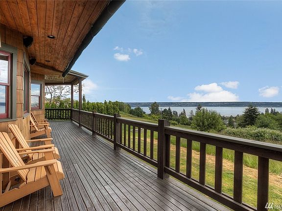 Perched on the hillside in a commanding position above the sparkling waters of the Puget Sound.