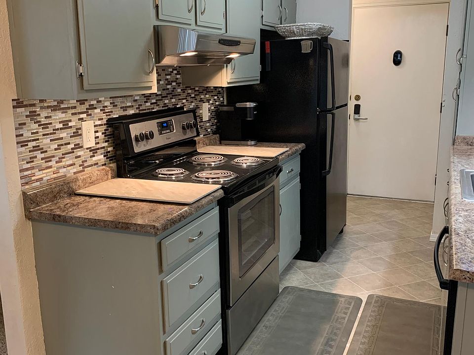 Whirlpool 4 burner stove/oven with exhaust fan and stove lights. Under cabinet lights, 2 hot tiles on each side of stove with magnetic top shelf directly on back of stovetop. Some drawer dividers, heavy pan shelfing inside bottom cabinet, storage under o