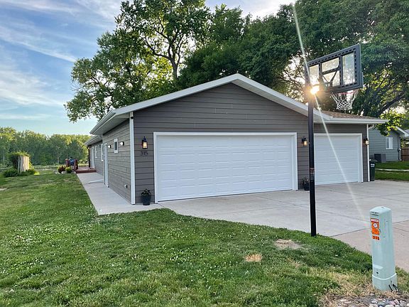 Street view of house and basketball hoop