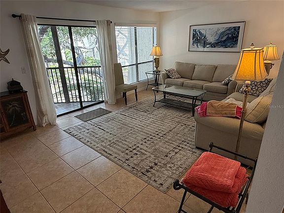 5th image of 6157 Midnight Pass Rd APT F22