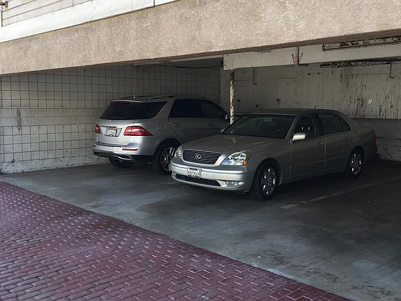 Covered (one space) parking-Other space is open parking (both spaces are assigned)