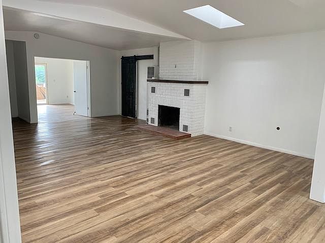 Living Room (across from fireplace is built in shelves)