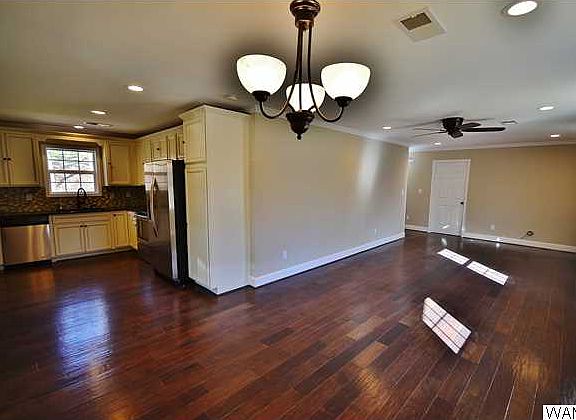 Interior of this house is where the WOW factor comes into play. Hardwood floors throughout the livin