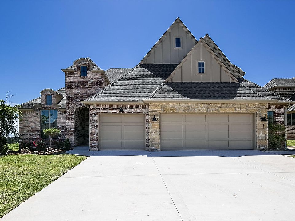 Front Exterior with 3 Car Garage