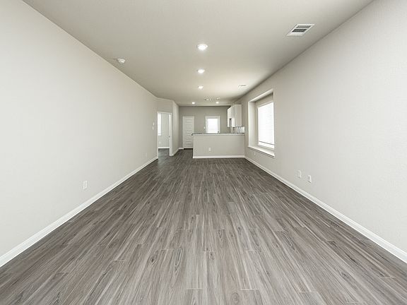 Family Room to Dining Area and Kitchen