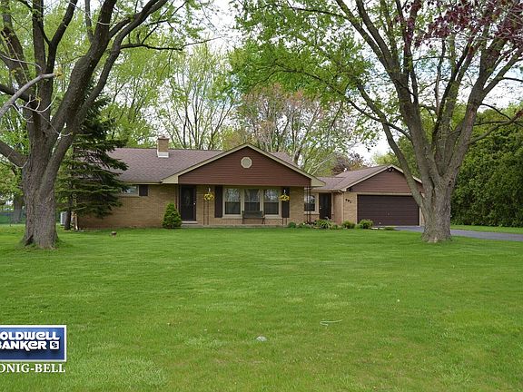 Front Exterior of home - full wrap around brick on a 3/4 of an acre lot!
