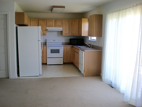 Pictures from previous listing - floors are not laminate.
