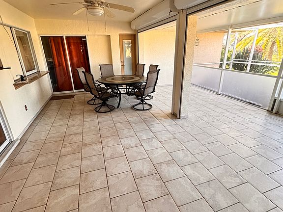 Foyer with Built-In Mini Bar Seating Connecting into the Kitchen