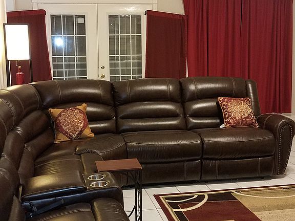 Living room w/ French doors.