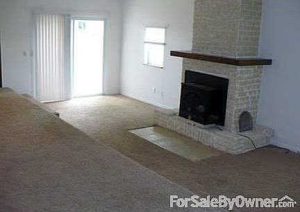 Family room with fireplace and insert
						:
						Freshly painted interior