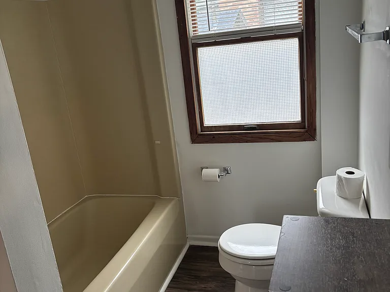Nice Tub- Hookups for Stackable Washer and Dryer on the left, inside the bathroom. Clean and easy set up.