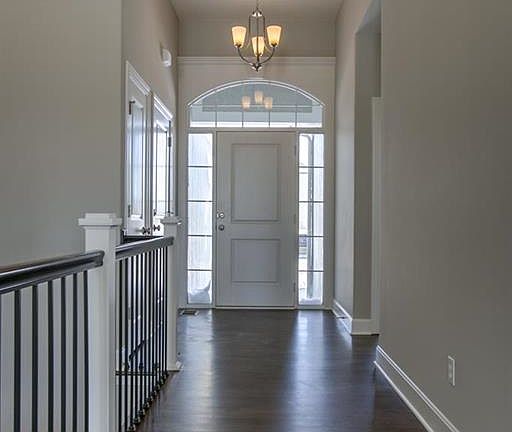 Entry way, hardwood floors, great natural light