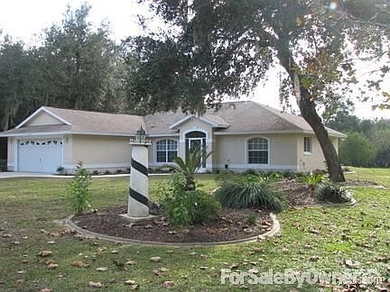 Front view
						:
						Curved sidewalk from drive to front entry