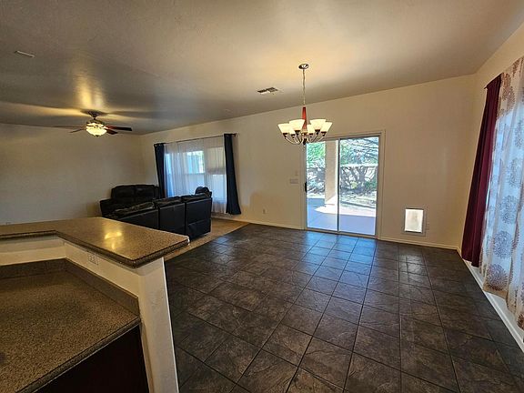 Dining room and Living room as seen from Kitchen.