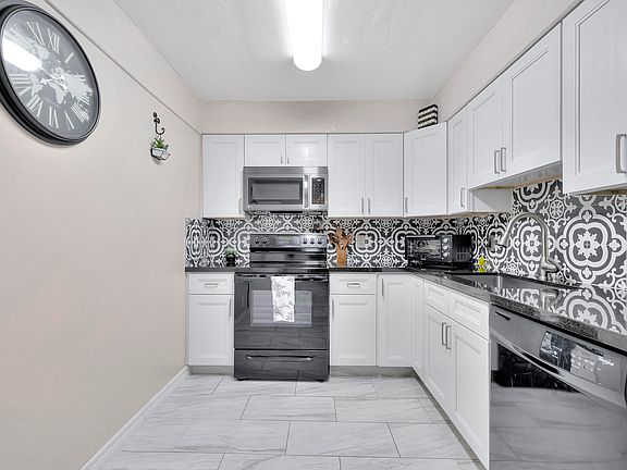2nd image of 6190 Woodlands Blvd APT 409