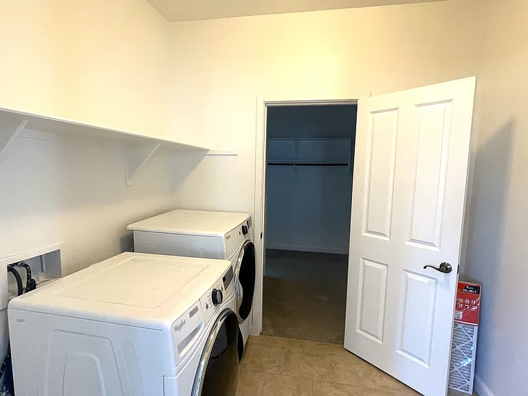Laundry upstairs w/ access to His/Her closet