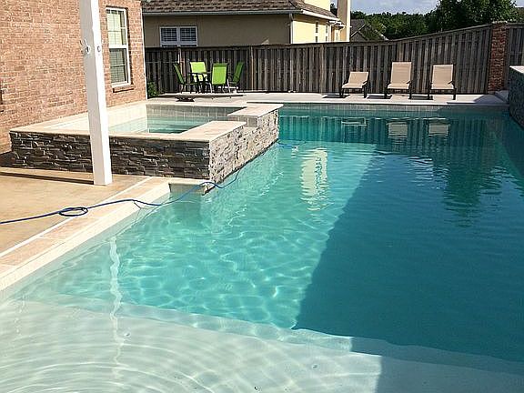 New 32,000 gal. gunite pool!