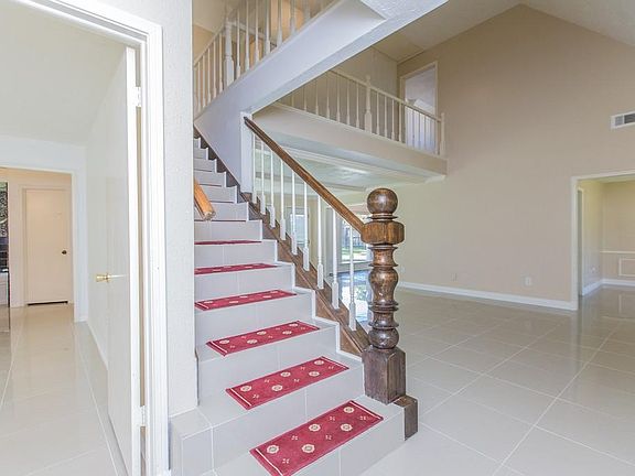 Elegant staircase overlooking the house