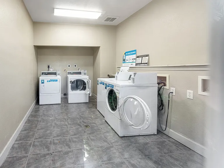 Convenient on-site laundry facilities at Cambury Hills Apartments, 16255 Emmet Plaza, Omaha, NE 68116. Professionally Operated by Highlands Vista Group.