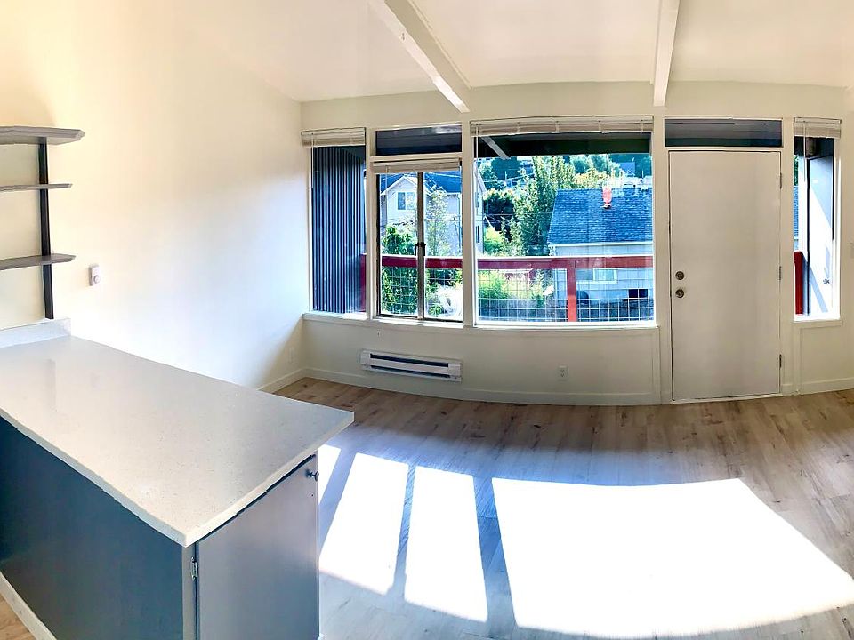 Open, modern floor plan with vaulted ceilings