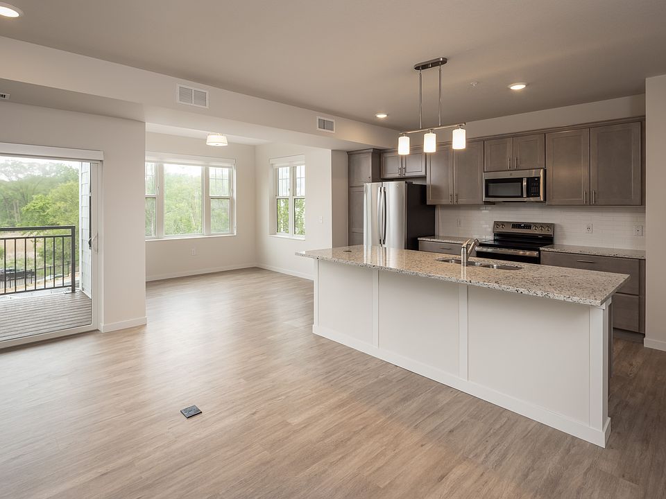 View of kitchen and sunroom in Buzz Aldrin 215