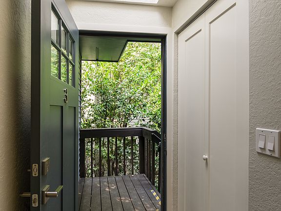 Top Floor Unit Entrance with Skylight & Coat Closet