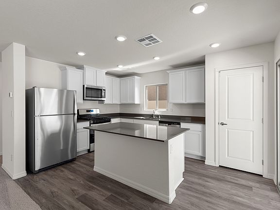 The kitchen of the Oak has energy-efficient appliances.