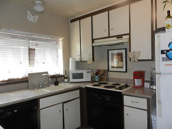 5th image of 6231 Village Green Dr