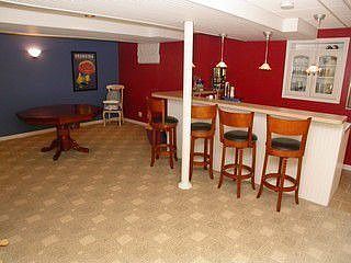 Finished basement, with bar, w2w carpeting, recessed lighting 
