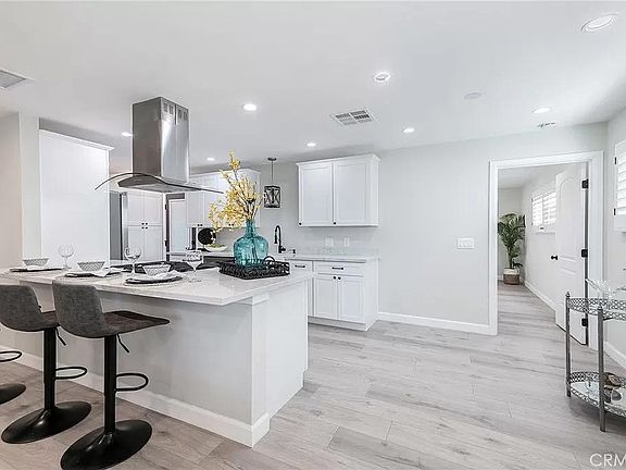 Main Kitchen - Shown with staging to highlight layout and potential.