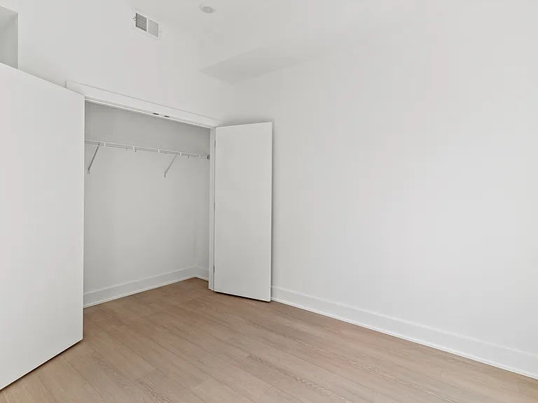 second bedroom- closet
*photo of similar unit, exact finishes and layouts may vary*
