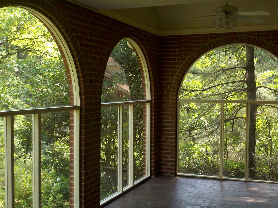 Glassed-in front porch