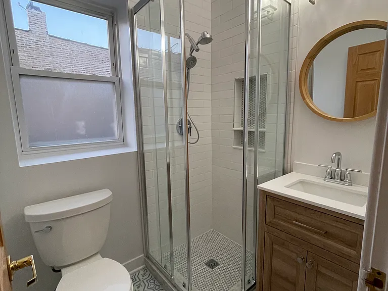 Newer gut rehabbed bathroom on second floor.