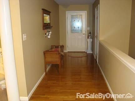 Entry way w/ hardwood and coat closet