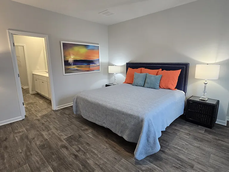 Primary bedroom with king sized bed