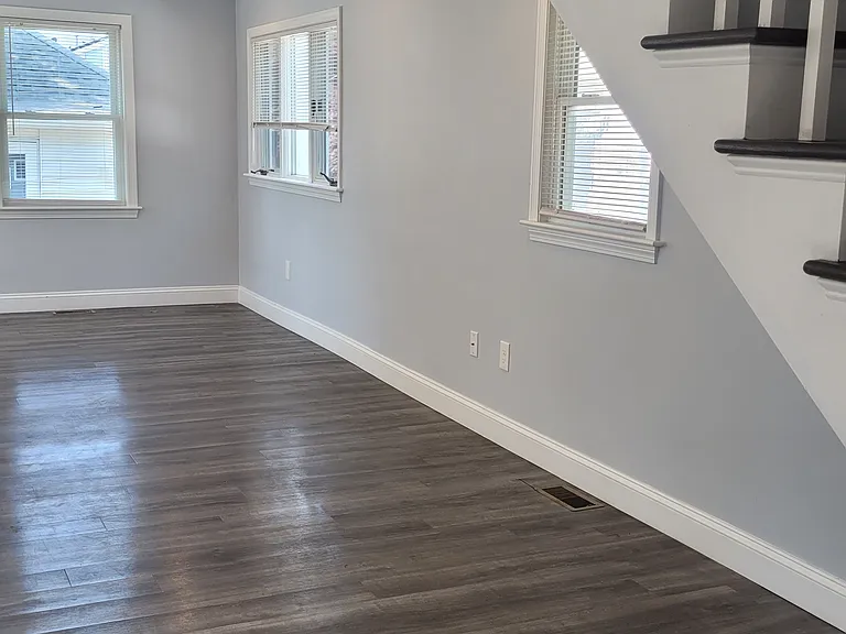 Living room with stairwell