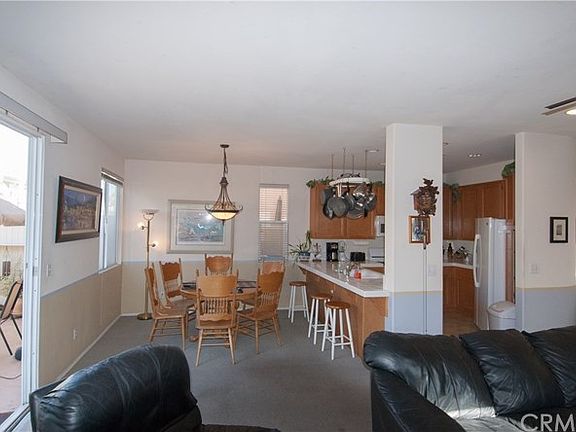 Open and airy dining area meets the kitchen with lots of natural light!