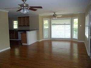 Living room into dining area and kitchen