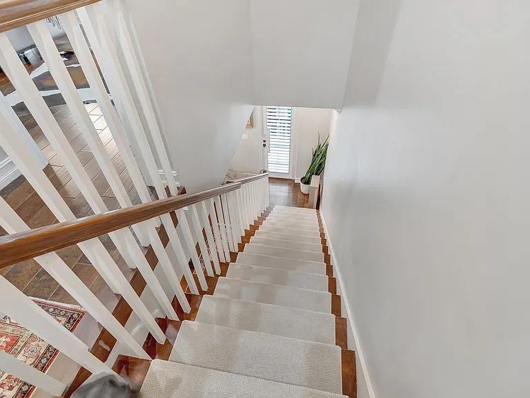 Stairs looking down from 3rd floor