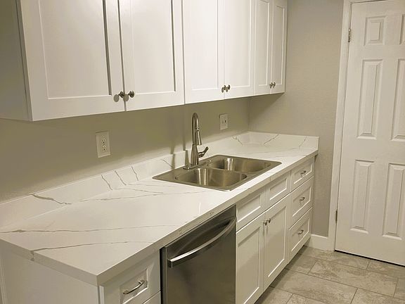 New Kitchen Cabinets, Quartz Countertops, and Dishwasher