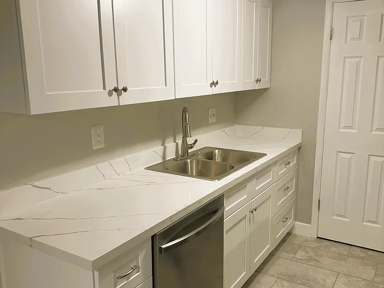 New Kitchen Cabinets, Quartz Countertops, and Dishwasher