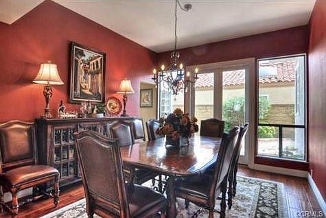 Formal dining room with French doors to side patio