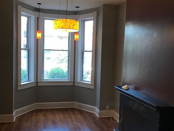 living room windows looking into back yard