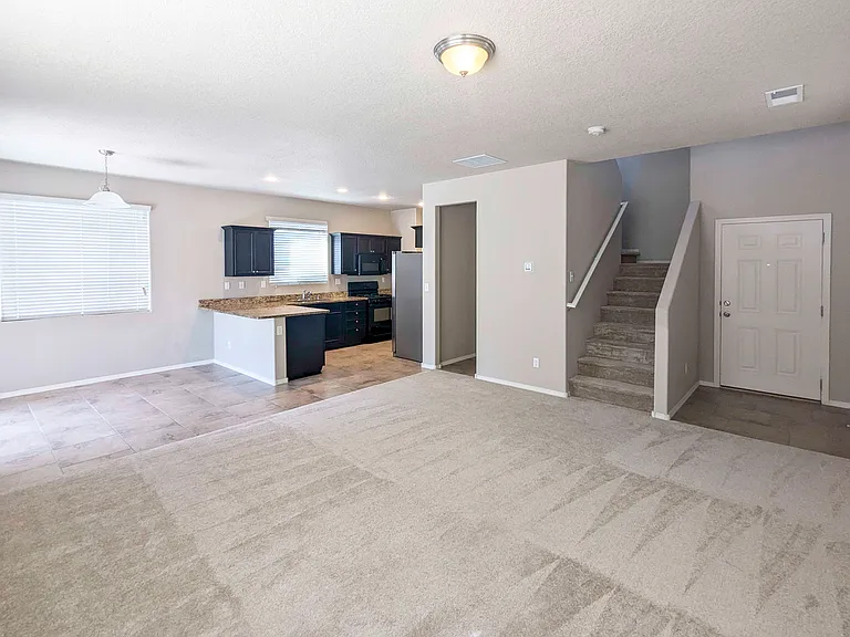 Entry, living room, dining, kitchen