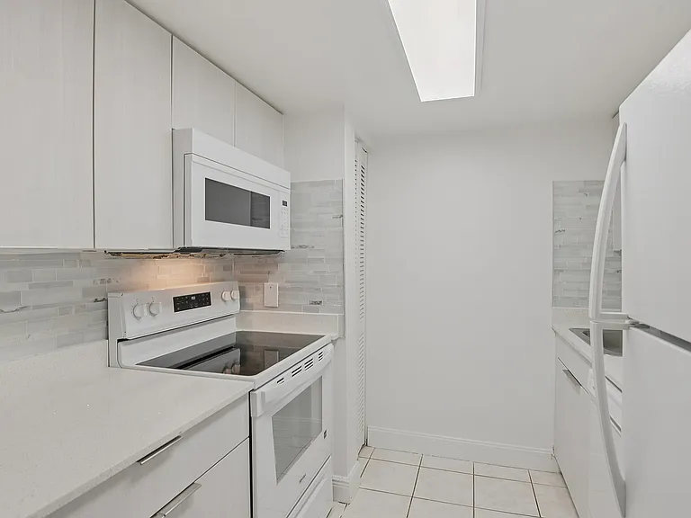 Kitchen with Designer Backsplash Tile