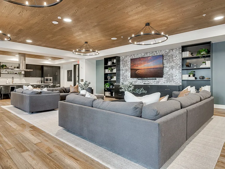 Relax and connect in our spacious community room with modern comforts.
