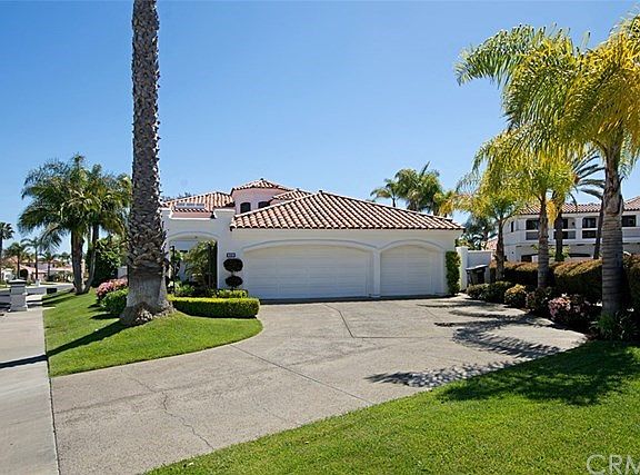 The large driveway has plenty of room for numerous cars!