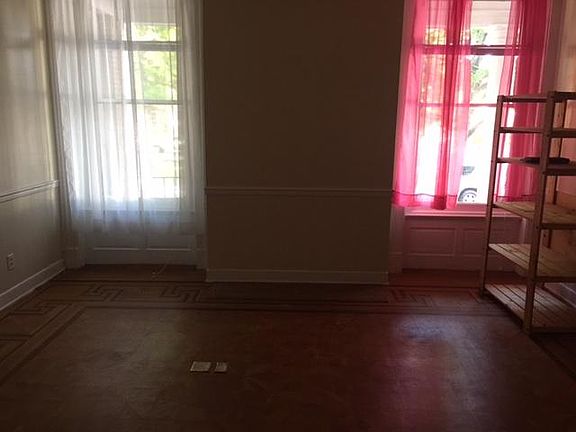 Bedroom, windows facing Monument, closet on my right